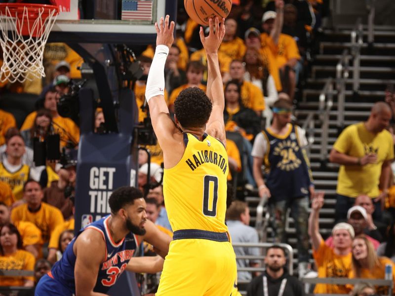 INDIANAPOLIS, IN - MAY 25:  Tyrese Haliburton #0 of the Indiana Pacers shoots a three point basket during the game against the New York Knicks  during Game 3 of the 2025 Eastern Conference Finals on May 25, 2025 at Gainbridge Fieldhouse in Indianapolis, Indiana. NOTE TO USER: User expressly acknowledges and agrees that, by downloading and or using this Photograph, user is consenting to the terms and conditions of the Getty Images License Agreement. Mandatory Copyright Notice: Copyright 2025 NBAE (Photo by Nathaniel S. Butler/NBAE via Getty Images)
