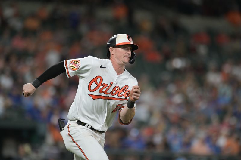 Aug 23, 2023; Baltimore, Maryland, USA;  Baltimore Orioles left fielder Austin Hays (21) runs out a third inning double against the Toronto Blue Jays at Oriole Park at Camden Yards. Mandatory Credit: Tommy Gilligan-USA TODAY Sports