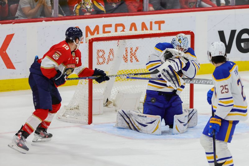 Apr 13, 2024; Sunrise, Florida, USA; Buffalo Sabres goaltender Ukko-Pekka Luukkonen (1) makes a save against Florida Panthers left wing Matthew Tkachuk (19) during the third period at Amerant Bank Arena. Mandatory Credit: Sam Navarro-USA TODAY Sports