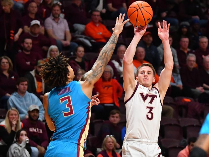 Feb 13, 2024; Blacksburg, Virginia, USA;Virginia Tech Hokies guard Sean Pedulla (3) shoots a three point shot while being defended by Florida State Seminoles forward Cam Corhen (3) during the second half at Cassell Coliseum. Mandatory Credit: Brian Bishop-USA TODAY Sports