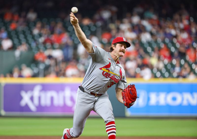 Jun 5, 2024; Houston, Texas, USA; St. Louis Cardinals starting pitcher Miles Mikolas (39) delivers a pitch during the second inning against the Houston Astros at Minute Maid Park. Mandatory Credit: Troy Taormina-USA TODAY Sports