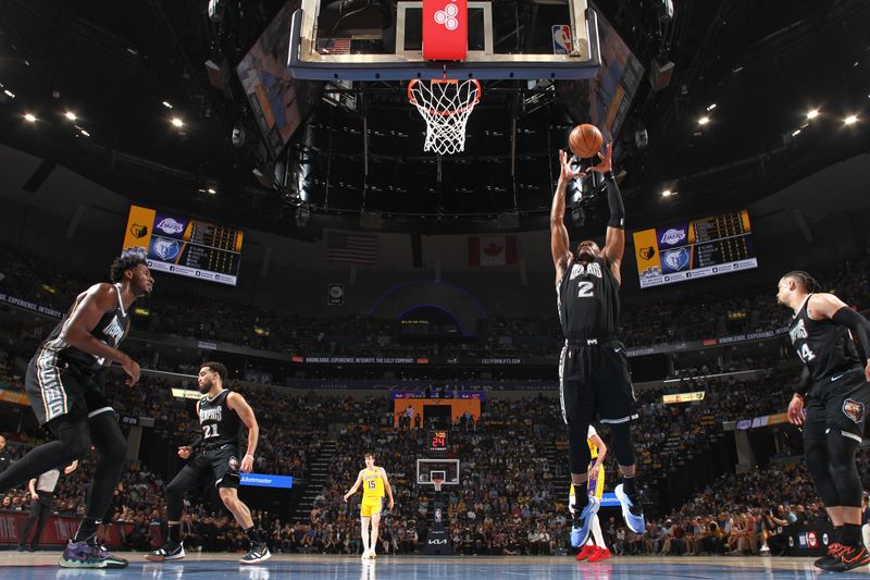 MEMPHIS, TN - APRIL 19: Xavier Tillman #2 of the Memphis Grizzlies rebounds the ball during Round One Game Two of the 2023 NBA Playoffs against the Los Angeles Lakers on April 19, 2023 at FedExForum in Memphis, Tennessee. NOTE TO USER: User expressly acknowledges and agrees that, by downloading and or using this photograph, User is consenting to the terms and conditions of the Getty Images License Agreement. Mandatory Copyright Notice: Copyright 2023 NBAE (Photo by Joe Murphy/NBAE via Getty Images)