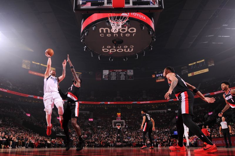 PORTLAND, OR - DECEMBER 1: Luka Doncic #77 of the Dallas Mavericks shoots the ball during the game against the Portland Trail Blazers on December 1, 2024 at the Moda Center Arena in Portland, Oregon. NOTE TO USER: User expressly acknowledges and agrees that, by downloading and or using this photograph, user is consenting to the terms and conditions of the Getty Images License Agreement. Mandatory Copyright Notice: Copyright 2024 NBAE (Photo by Cameron Browne/NBAE via Getty Images)