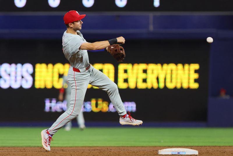 Sep 6, 2024; Miami, Florida, USA; Philadelphia Phillies shortstop Trea Turner (7) throws to first base to retire Miami Marlins designated hitter Jesus Sanchez (not pictured) during the second inning at loanDepot Park. Mandatory Credit: Sam Navarro-Imagn Images