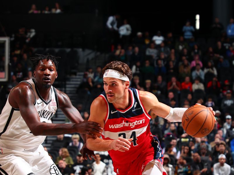BROOKLYN, NY - OCTOBER 14: Corey Kispert #24 of the Washington Wizards dribbles the ball during the game against the Brooklyn Nets during a NBA preseason game on October 14, 2024 at Barclays Center in Brooklyn, New York. NOTE TO USER: User expressly acknowledges and agrees that, by downloading and or using this Photograph, user is consenting to the terms and conditions of the Getty Images License Agreement. Mandatory Copyright Notice: Copyright 2024 NBAE (Photo by David L. Nemec/NBAE via Getty Images)