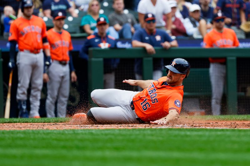 Jul 20, 2025; Seattle, Washington, USA; Houston Astros left fielder Cooper Hummel (16) scores a run against the Seattle Mariners during the fifth inning at T-Mobile Park. Mandatory Credit: Joe Nicholson-Imagn Images