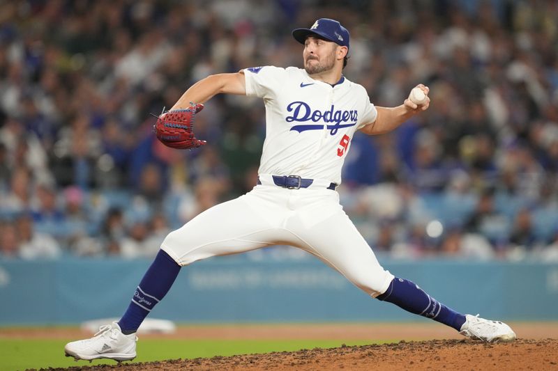 Sep 25, 2024; Los Angeles, California, USA;  Los Angeles Dodgers relief pitcher Alex Vesia (51) pitches in the sixth inning against the San Diego Padres at Dodger Stadium. Mandatory Credit: Kirby Lee-Imagn Images