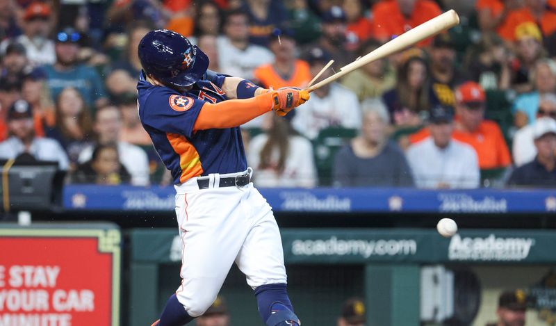 Sep 10, 2023; Houston, Texas, USA; Houston Astros second baseman Jose Altuve (27) breaks his bat on a ground ball during the first inning against the San Diego Padres at Minute Maid Park. Mandatory Credit: Troy Taormina-USA TODAY Sports