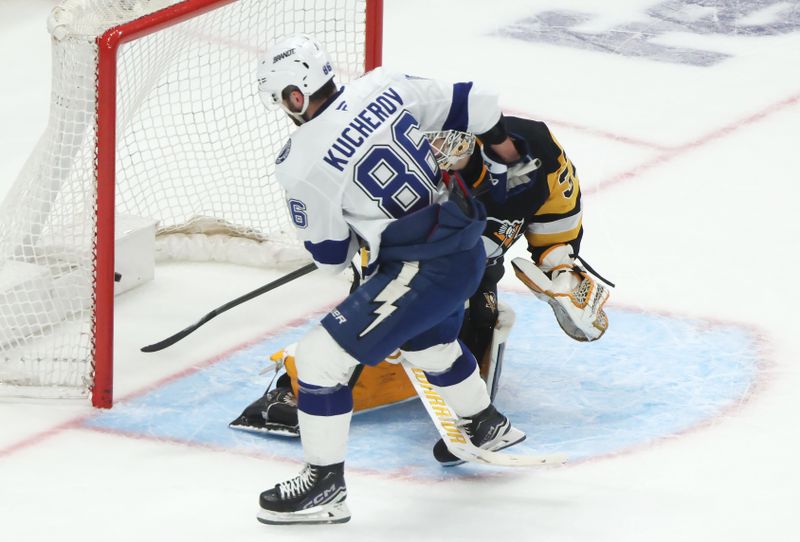 Jan 13, 2026; Pittsburgh, Pennsylvania, USA;  Tampa Bay Lightning right wing Nikita Kucherov (86) scores a game winning shootout goal against Pittsburgh Penguins goaltender Arturs Silovs (37) at PPG Paints Arena. Mandatory Credit: Charles LeClaire-Imagn Images