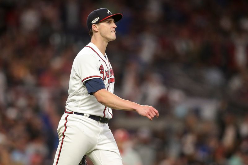 Oct 12, 2022; Atlanta, Georgia, USA; Atlanta Braves starting pitcher Kyle Wright (30) reacts after striking out Philadelphia Phillies first baseman Rhys Hoskins (17) in the sixth inning during game two of the NLDS for the 2022 MLB Playoffs at Truist Park. Mandatory Credit: Brett Davis-USA TODAY Sports