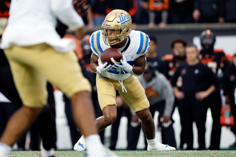 Oct 14, 2023; Corvallis, Oregon, USA; UCLA Bruins wide receiver Keegan Jones (22) makes a catch during the first half against the Oregon State Beavers at Reser Stadium. Mandatory Credit: Soobum Im-USA TODAY Sports