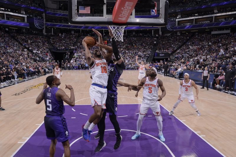 SACRAMENTO, CA - MARCH 16: Alec Burks #18 of the New York Knicks drives to the basket during the game against the Sacramento Kings on March 16, 2024 at Golden 1 Center in Sacramento, California. NOTE TO USER: User expressly acknowledges and agrees that, by downloading and or using this Photograph, user is consenting to the terms and conditions of the Getty Images License Agreement. Mandatory Copyright Notice: Copyright 2024 NBAE (Photo by Rocky Widner/NBAE via Getty Images)