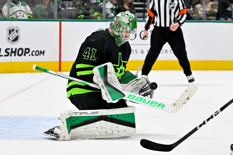 Jan 10, 2024; Dallas, Texas, USA; Dallas Stars goaltender Scott Wedgewood (41) makes a save on a Minnesota Wild shot during the third period at the American Airlines Center. Mandatory Credit: Jerome Miron-USA TODAY Sports