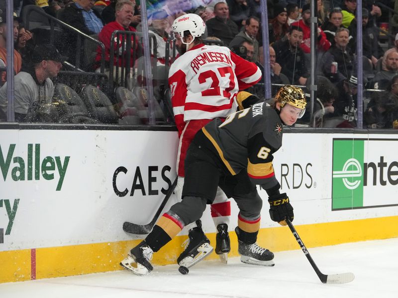 Jan 19, 2023; Las Vegas, Nevada, USA; Vegas Golden Knights defenseman Kaedan Korczak (6) checks Detroit Red Wings center Michael Rasmussen (27) during the first period at T-Mobile Arena. Mandatory Credit: Stephen R. Sylvanie-USA TODAY Sports