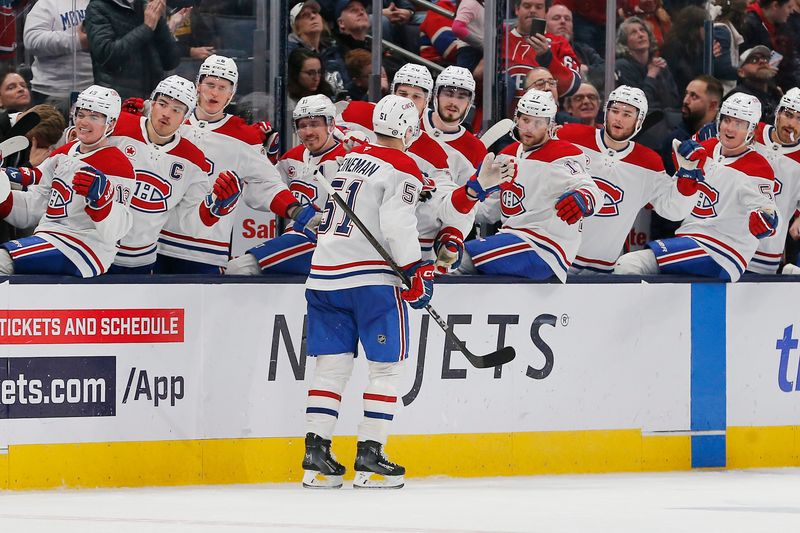 Nov 27, 2024; Columbus, Ohio, USA; Montreal Canadiens left wing Emil Heineman (51) celebrates his goal against the Columbus Blue Jackets during the third period at Nationwide Arena. Mandatory Credit: Russell LaBounty-Imagn Images