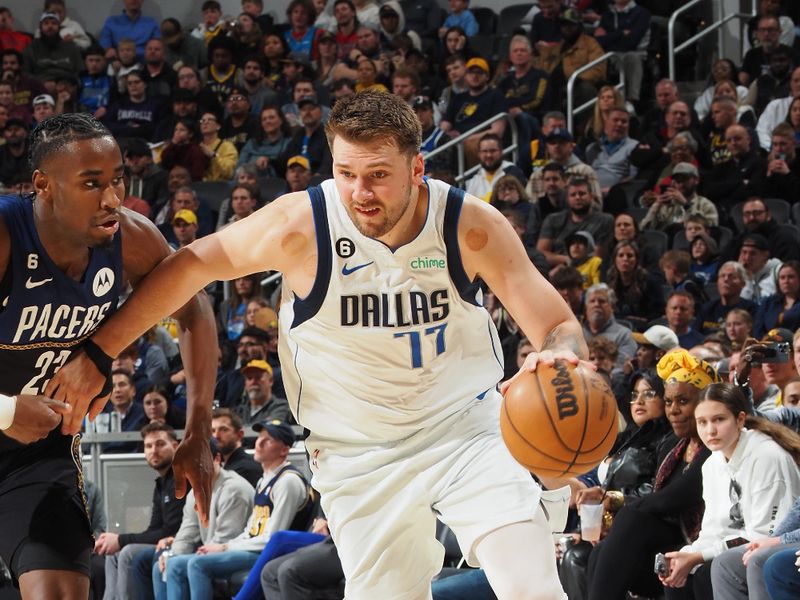 INDIANAPOLIS, IN - MARCH 27: Luka Doncic #77 of the Dallas Mavericks dribbles the ball during the game against the Indiana Pacers on March 27, 2023 at Gainbridge Fieldhouse in Indianapolis, Indiana. NOTE TO USER: User expressly acknowledges and agrees that, by downloading and or using this Photograph, user is consenting to the terms and conditions of the Getty Images License Agreement. Mandatory Copyright Notice: Copyright 2023 NBAE (Photo by Ron Hoskins/NBAE via Getty Images)