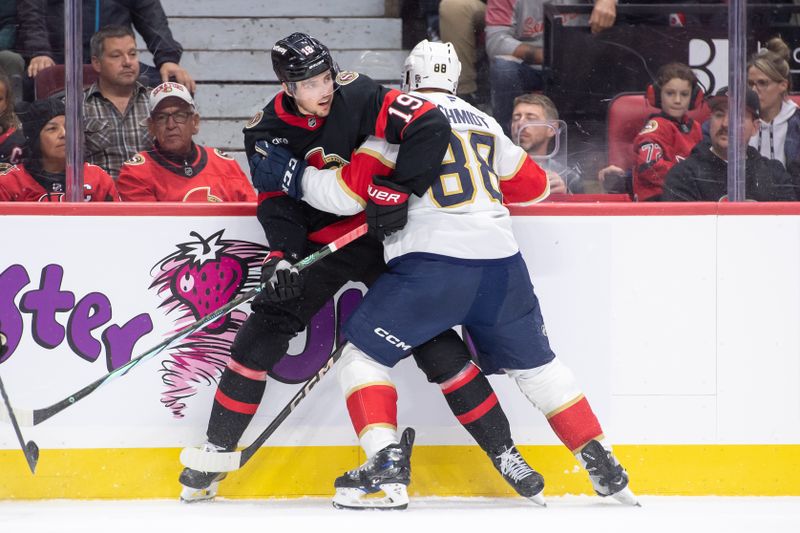 Oct 10, 2024; Ottawa, Ontario, CAN; Ottawa Senators right wing Drake Batherson (19) battles with defenseman Nate Schmidt (88) in the second period at the Canadian Tire Centre. Mandatory Credit: Marc DesRosiers-Imagn Images