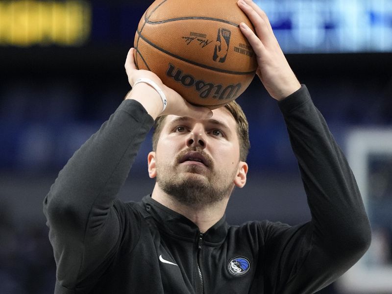 DALLAS, TEXAS - NOVEMBER 05: Luka Doncic #77 of the Dallas Mavericks warms up before a game against the Charlotte Hornets at American Airlines Center on November 05, 2023 in Dallas, Texas. NOTE TO USER: User expressly acknowledges and agrees that, by downloading and or using this photograph, User is consenting to the terms and conditions of the Getty Images License Agreement. (Photo by Sam Hodde/Getty Images)