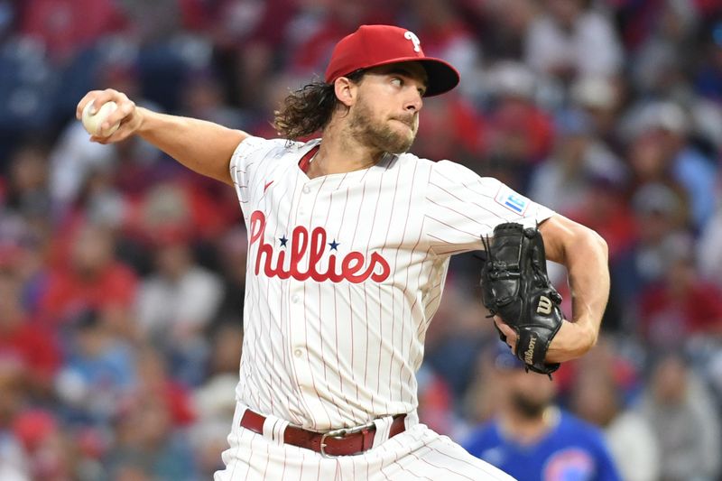 Sep 23, 2024; Philadelphia, Pennsylvania, USA; Philadelphia Phillies pitcher Aaron Nola (27) throws a pitch during the first inning against the Chicago Cubs at Citizens Bank Park. Mandatory Credit: Eric Hartline-Imagn Images