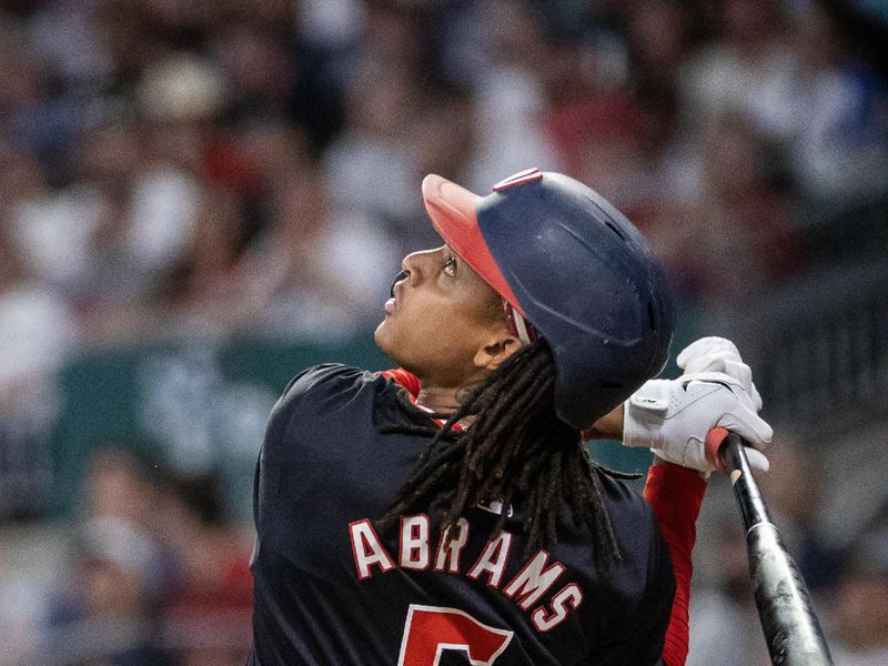 Aug 23, 2024; Cumberland, Georgia, USA; Washington Nationals shortstop CJ Abrams (5) watches the ball hit against Atlanta Braves in the air during the tenth inning at Truist Park. Mandatory Credit: Jordan Godfree-USA TODAY Sports