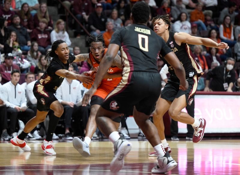 Mar 4, 2023; Blacksburg, Virginia, USA; Virginia Tech Hokies guard MJ Collins (2) drives against the Florida State Seminole in the second half at Cassell Coliseum. Mandatory Credit: Lee Luther Jr.-USA TODAY Sports