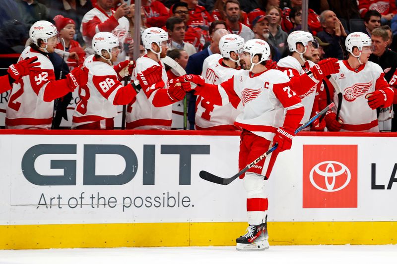 Mar 18, 2025; Washington, District of Columbia, USA; Detroit Red Wings center Dylan Larkin (71) celebrate after scoring a goal during the first period against the Washington Capitals at Capital One Arena. Mandatory Credit: Peter Casey-Imagn Images