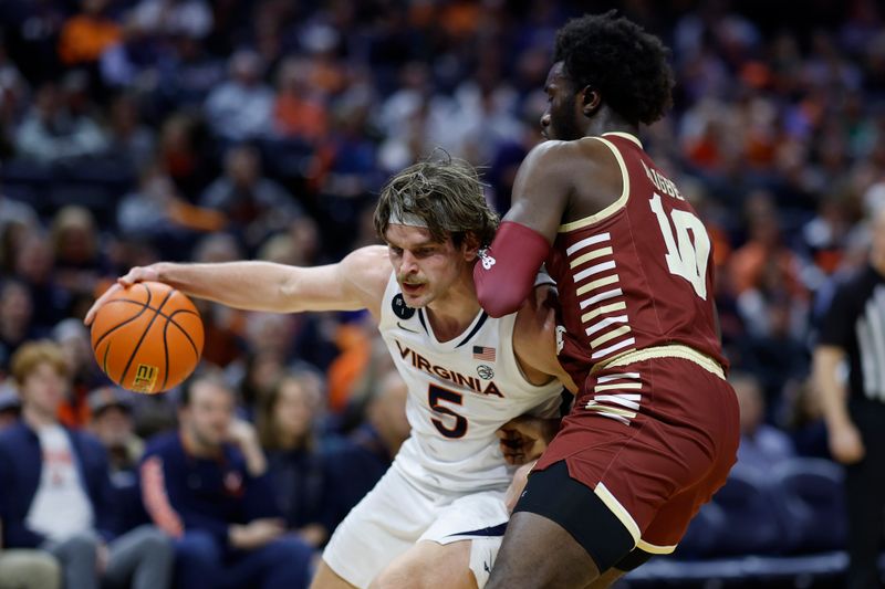 Jan 28, 2023; Charlottesville, Virginia, USA; Virginia Cavaliers forward Ben Vander Plas (5) drives to the basket as Boston College Eagles guard Prince Aligbe (10) defends in the second half at John Paul Jones Arena. Mandatory Credit: Geoff Burke-USA TODAY Sports