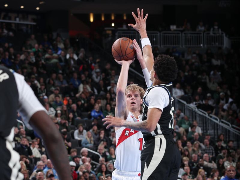 MILWAUKEE, WI - NOVEMBER 12:  Gradey Dick #1 of the Toronto Raptors shoots the ball during the game against the Milwaukee Bucks  during the Emirates NBA Cup game on November 12, 2024 at Fiserv Forum Center in Milwaukee, Wisconsin. NOTE TO USER: User expressly acknowledges and agrees that, by downloading and or using this Photograph, user is consenting to the terms and conditions of the Getty Images License Agreement. Mandatory Copyright Notice: Copyright 2024 NBAE (Photo by Gary Dineen/NBAE via Getty Images).