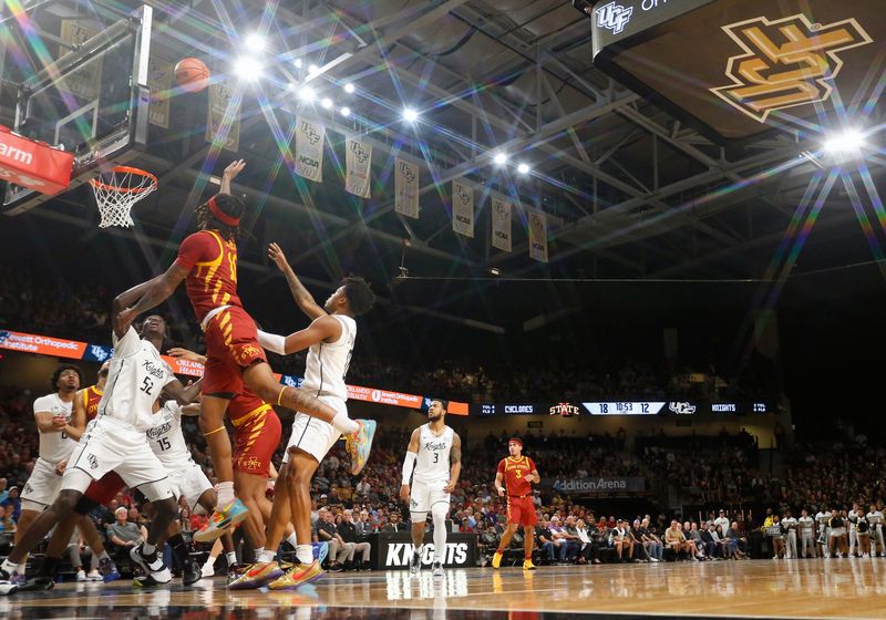 Feb 11, 2025; Orlando, Florida, USA;  Iowa State Cyclones guard Keshon Gilbert (10) lays the ball up against the Central Florida Knights at Addition Financial Arena. Mandatory Credit: Russell Lansford-Imagn Images