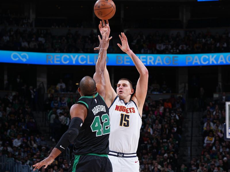 DENVER, CO - JANUARY 1: Nikola Jokic #15 of the Denver Nuggets shoots the ball on January 1, 2023 at the Ball Arena in Denver, Colorado. NOTE TO USER: User expressly acknowledges and agrees that, by downloading and/or using this Photograph, user is consenting to the terms and conditions of the Getty Images License Agreement. Mandatory Copyright Notice: Copyright 2022 NBAE (Photo by Garrett Ellwood/NBAE via Getty Images)