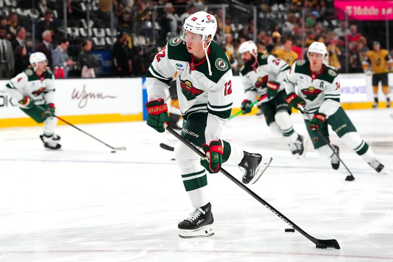 Apr 12, 2024; Las Vegas, Nevada, USA; Minnesota Wild left wing Matt Boldy (12) warms up before the start of a game against the Vegas Golden Knights at T-Mobile Arena. Mandatory Credit: Stephen R. Sylvanie-USA TODAY Sports