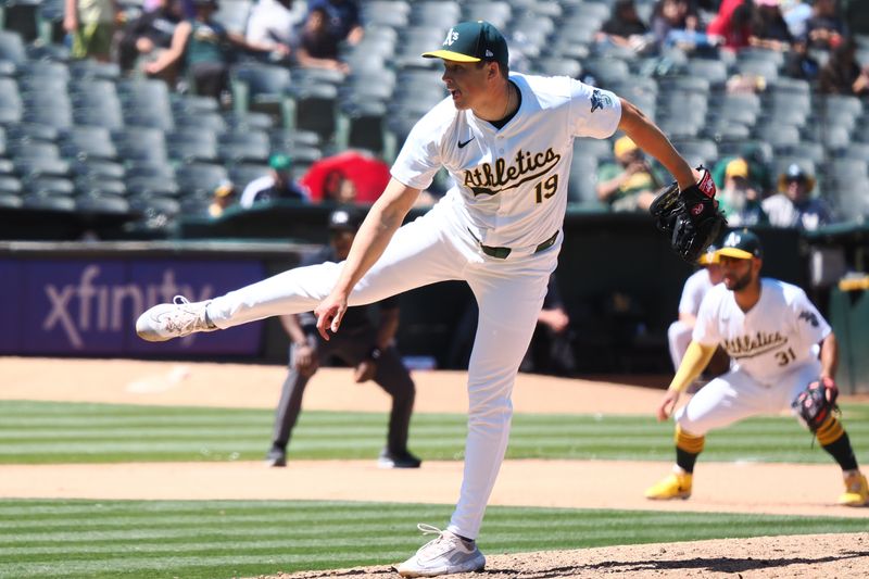 May 23, 2024; Oakland, California, USA; Oakland Athletics relief pitcher Mason Miller (19) pitches the ball against the Colorado Rockies during the tenth inning at Oakland-Alameda County Coliseum. Mandatory Credit: Kelley L Cox-USA TODAY Sports