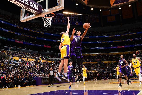 LOS ANGELES, CA - NOVEMBER 15: Keegan Murray #13 of the Sacramento Kings drives to the basket during the game against the Los Angeles Lakers on November 15, 2023 at Crypto.Com Arena in Los Angeles, California. NOTE TO USER: User expressly acknowledges and agrees that, by downloading and/or using this Photograph, user is consenting to the terms and conditions of the Getty Images License Agreement. Mandatory Copyright Notice: Copyright 2023 NBAE (Photo by Adam Pantozzi/NBAE via Getty Images)