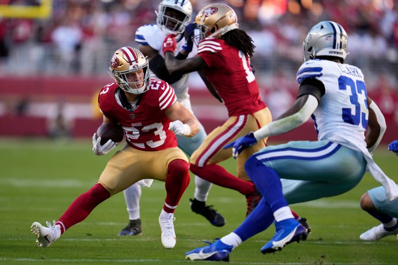 San Francisco 49ers running back Christian McCaffrey (23) runs against the Dallas Cowboys during the first half of an NFL football game in Santa Clara, Calif., Sunday, Oct. 8, 2023. (AP Photo/Godofredo A. Vásquez)