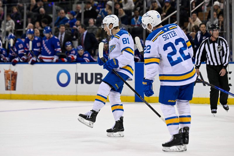 Nov 24, 2025; New York, New York, USA;  St. Louis Blues left wing Dylan Holloway (81) celebrates his goal against the New York Rangers during the first period at Madison Square Garden. Mandatory Credit: Dennis Schneidler-Imagn Images