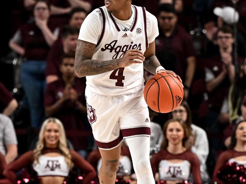 Mar 4, 2023; College Station, Texas, USA; Texas A&M Aggies guard Wade Taylor IV (4) dribbles the ball against the Alabama Crimson Tide during the second half at Reed Arena. Mandatory Credit: Maria Lysaker-USA TODAY Sports