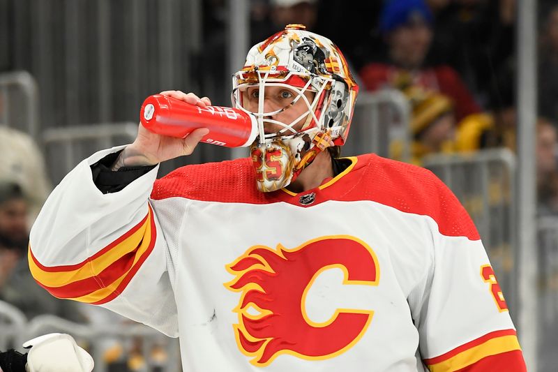 Feb 6, 2024; Boston, Massachusetts, USA; Calgary Flames goaltender Jacob Markstrom (25) takes a drink of water during the first period against the Boston Bruins at TD Garden. Mandatory Credit: Bob DeChiara-USA TODAY Sports