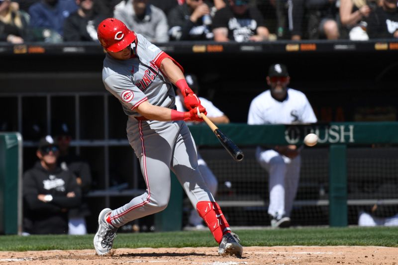 Apr 13, 2024; Chicago, Illinois, USA; Cincinnati Reds left fielder Spencer Steer (7) hits a three-run double during the second inning against the Chicago White Sox at Guaranteed Rate Field. Mandatory Credit: Patrick Gorski-USA TODAY Sports