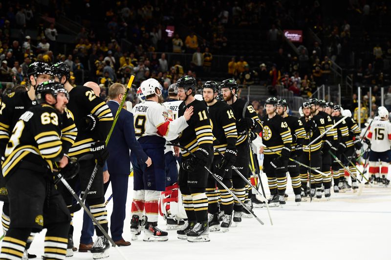 May 17, 2024; Boston, Massachusetts, USA; Florida Panthers left wing Matthew Tkachuk (19) and Boston Bruins center Trent Frederic (11) shake hands after the Panthers defeated the Bruins in game six of the second round of the 2024 Stanley Cup Playoffs at TD Garden. Mandatory Credit: Bob DeChiara-USA TODAY Sports