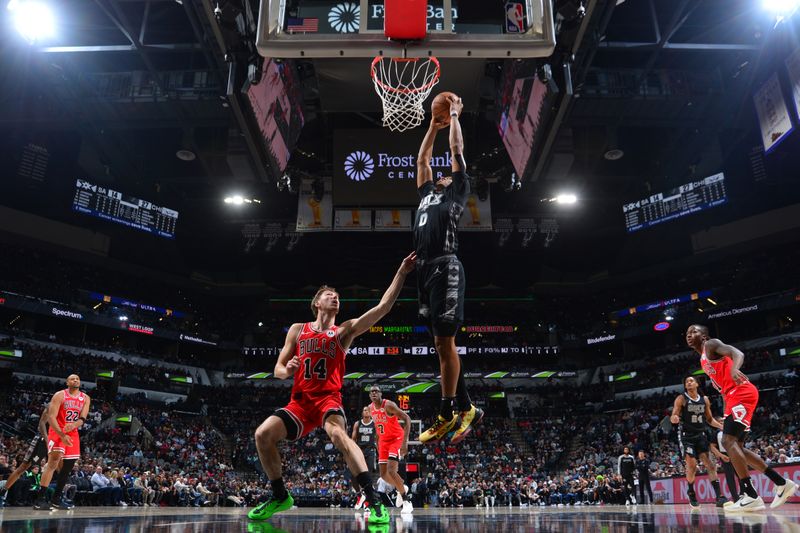 SAN ANTONIO, TX - DECEMBER 5: Keldon Johnson #0 of the San Antonio Spurs drives to the basket during the game against the Chicago Bulls on December 5, 2024 at the Frost Bank Center in San Antonio, Texas. NOTE TO USER: User expressly acknowledges and agrees that, by downloading and or using this photograph, user is consenting to the terms and conditions of the Getty Images License Agreement. Mandatory Copyright Notice: Copyright 2024 NBAE (Photos by Michael Gonzales/NBAE via Getty Images)