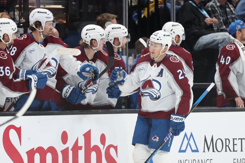 Oct 24, 2024; Salt Lake City, Utah, USA; Colorado Avalanche center Nathan MacKinnon (29) celebrates a goal against the Utah Hockey Club during the second period at Delta Center. Mandatory Credit: Rob Gray-Imagn Images