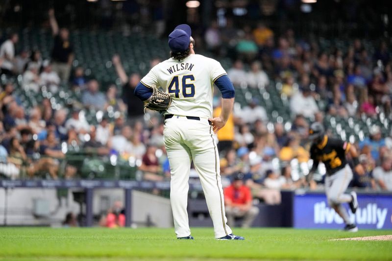 Jul 9, 2024; Milwaukee, Wisconsin, USA;  Milwaukee Brewers pitcher Bryse Wilson (46) reacts after giving up a grand slam home run to Pittsburgh Pirates catcher Joey Bart (14) (not pictured) during the sixth inning at American Family Field. Mandatory Credit: Jeff Hanisch-USA TODAY Sports