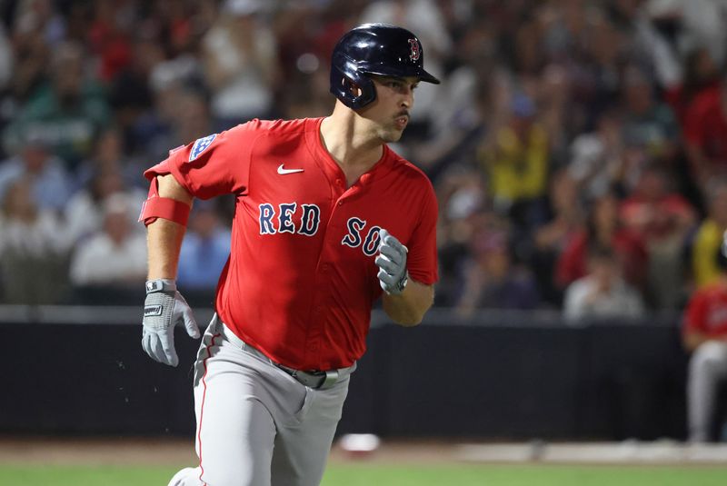 Sep 19, 2025; Tampa, Florida, USA; Boston Red Sox first baseman Nathaniel Lowe (37) hits a RBI single during the second inning against the Tampa Bay Rays at George M. Steinbrenner Field. Mandatory Credit: Kim Klement Neitzel-Imagn Images