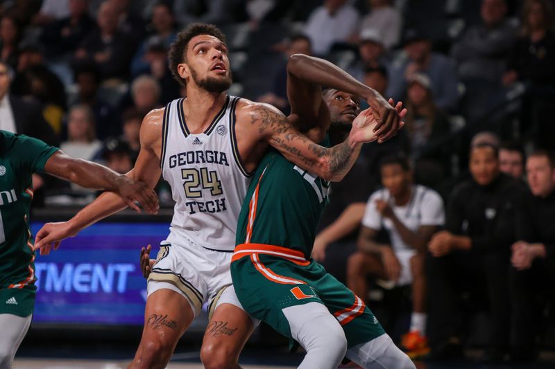 Jan 4, 2023; Atlanta, Georgia, USA; Georgia Tech Yellow Jackets center Rodney Howard (24) boxes out Miami Hurricanes center Favour Aire (12) in the second half at McCamish Pavilion. Mandatory Credit: Brett Davis-USA TODAY Sports
