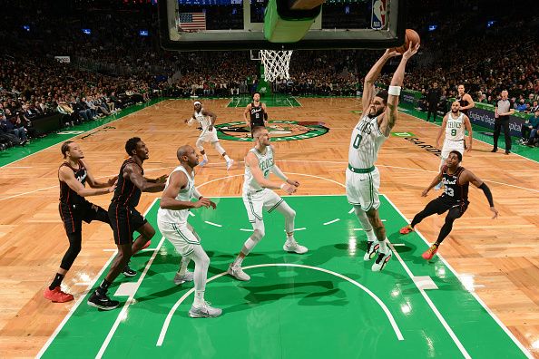 BOSTON, MA - DECEMBER 28: Jayson Tatum #0 of the Boston Celtics grabs a rebound during the game against the Detroit Pistons on December 28, 2023 at the TD Garden in Boston, Massachusetts. NOTE TO USER: User expressly acknowledges and agrees that, by downloading and or using this photograph, User is consenting to the terms and conditions of the Getty Images License Agreement. Mandatory Copyright Notice: Copyright 2023 NBAE  (Photo by Brian Babineau/NBAE via Getty Images)