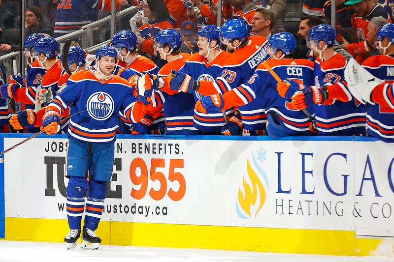 Feb 28, 2024; Edmonton, Alberta, CAN; The Edmonton Oilers celebrate a goal scored by forward Zach Hyman (18), his 40th goal of the season during the second period  against the St. Louis Blues at Rogers Place. Mandatory Credit: Perry Nelson-USA TODAY Sports