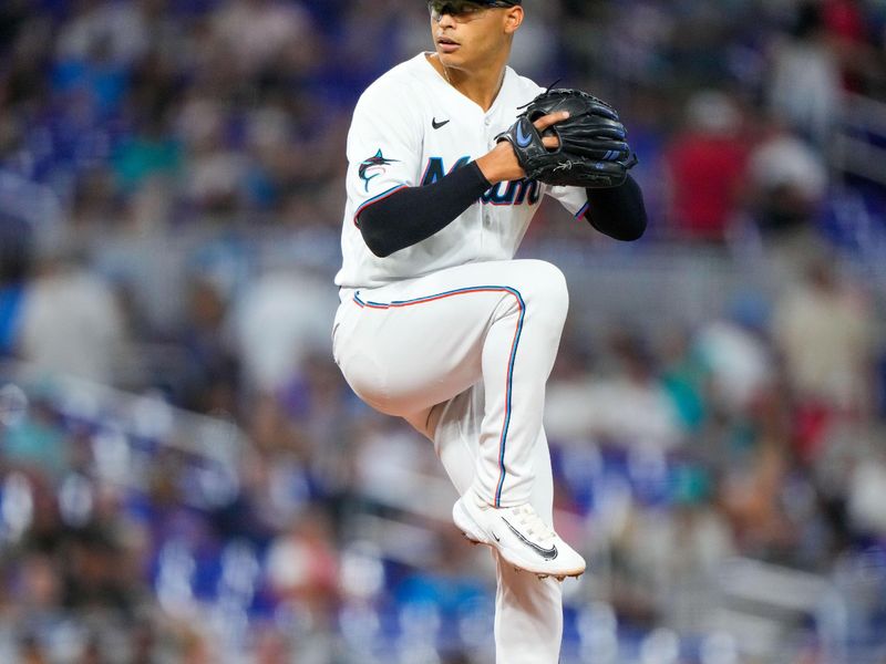 Sep 17, 2023; Miami, Florida, USA; Miami Marlins starting pitcher Jesus Luzardo (44) throws a pitch against the Atlanta Braves during the first inning at loanDepot Park. Mandatory Credit: Rich Storry-USA TODAY Sports