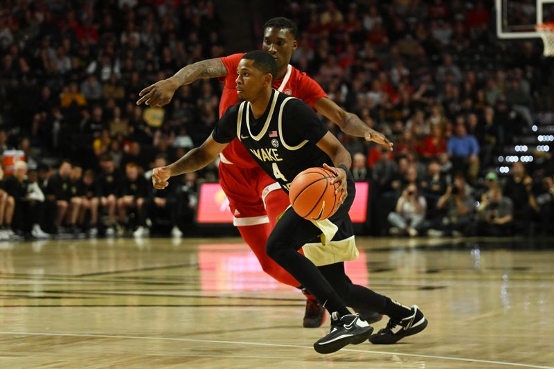 Jan 28, 2023; Winston-Salem, North Carolina, USA;  Wake Forest Demon Deacons guard Daivien Williamson (4) drives on North Carolina State Wolfpack forward Ernest Ross (24) during the first half at Lawrence Joel Veterans Memorial Coliseum. Mandatory Credit: William Howard-USA TODAY Sports