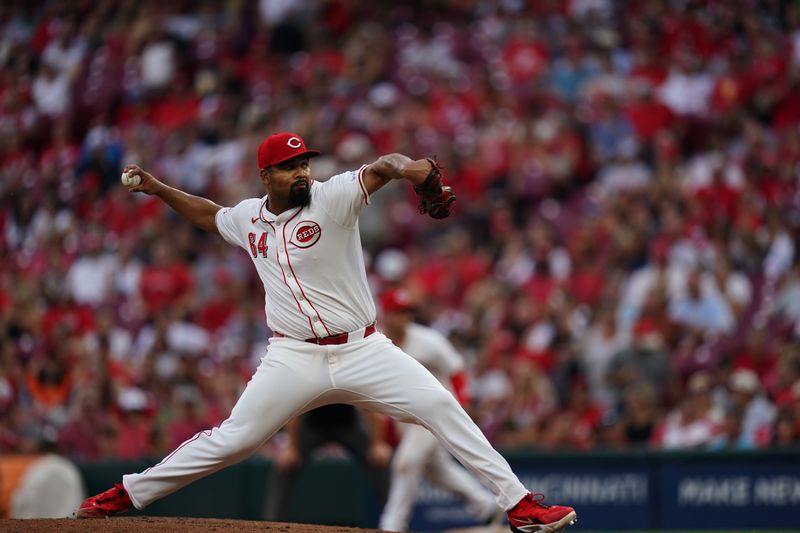 Aug 29, 2024; Cincinnati, Ohio, USA;  Cincinnati Reds pitcher Tony Santillan (64) throws the ball during the seventh inning of the MLB game between the Cincinnati Reds and Oakland Athletics, Thursday, Aug. 29, 2024, at Cintas Center in Cincinnati. The Reds won 10-9. Mandatory Credit: Frank Bowen IV/The Cincinnati Enquirer-USA TODAY Sports