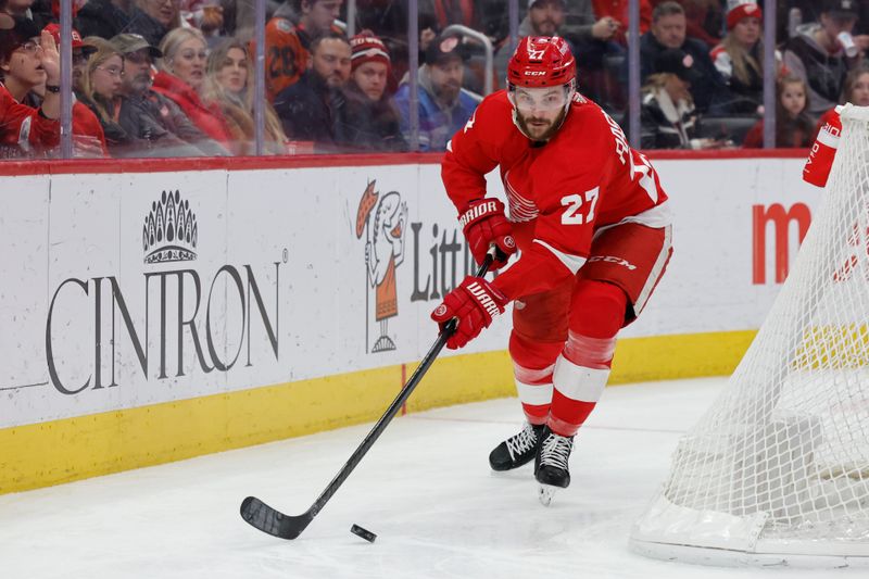 Jan 25, 2024; Detroit, Michigan, USA;  Detroit Red Wings center Michael Rasmussen (27) skates with the puck in the second period against the Philadelphia Flyers at Little Caesars Arena. Mandatory Credit: Rick Osentoski-USA TODAY Sports